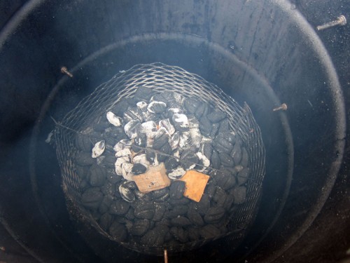 Hot coals dumped in basket.